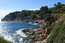 El Espenyador d´en Creus y el castillo de Sant Joan.